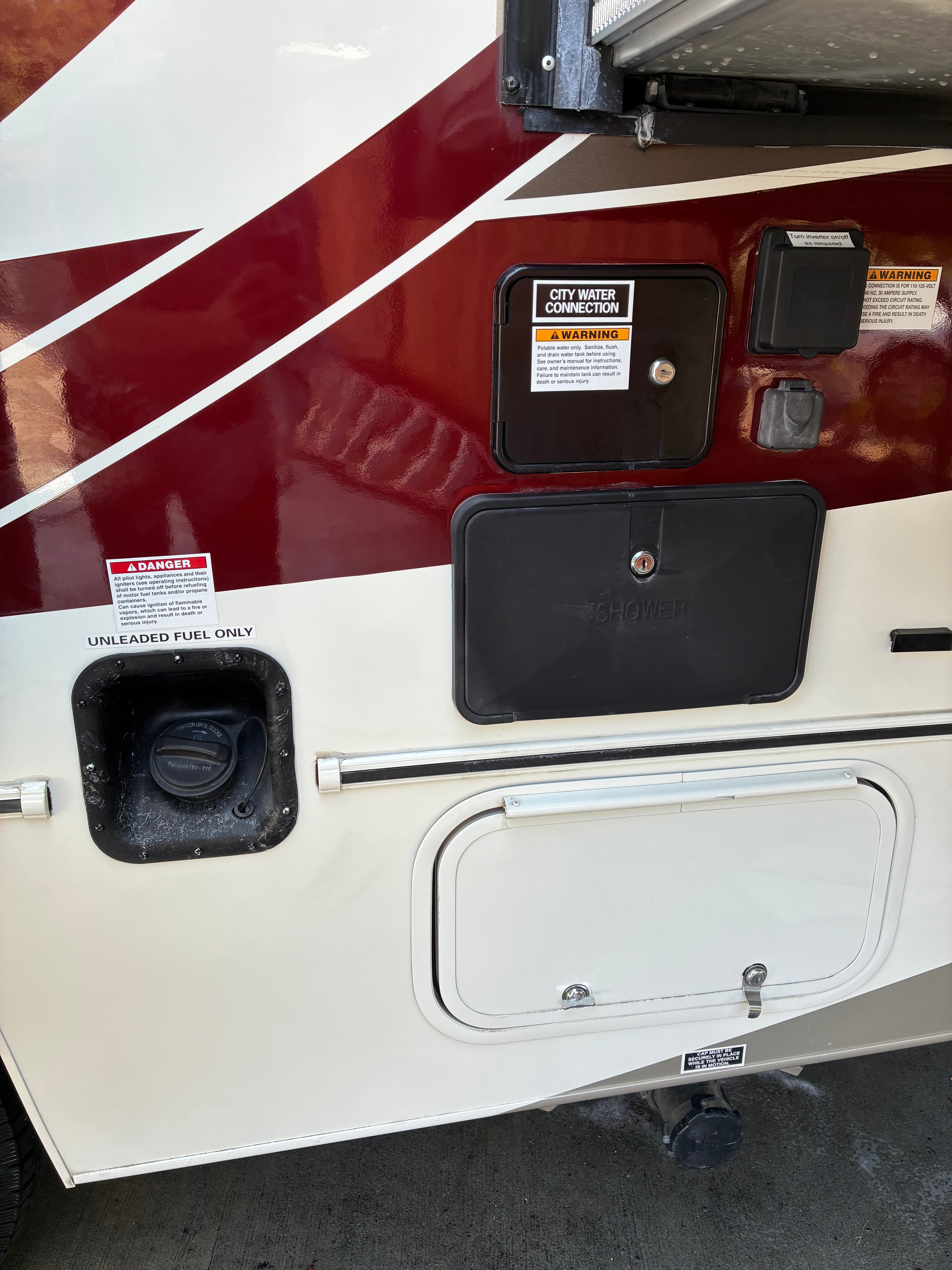 Class A motorhome utility compartment panels clean and restored after professional wash and wax in Edmonds, WA
