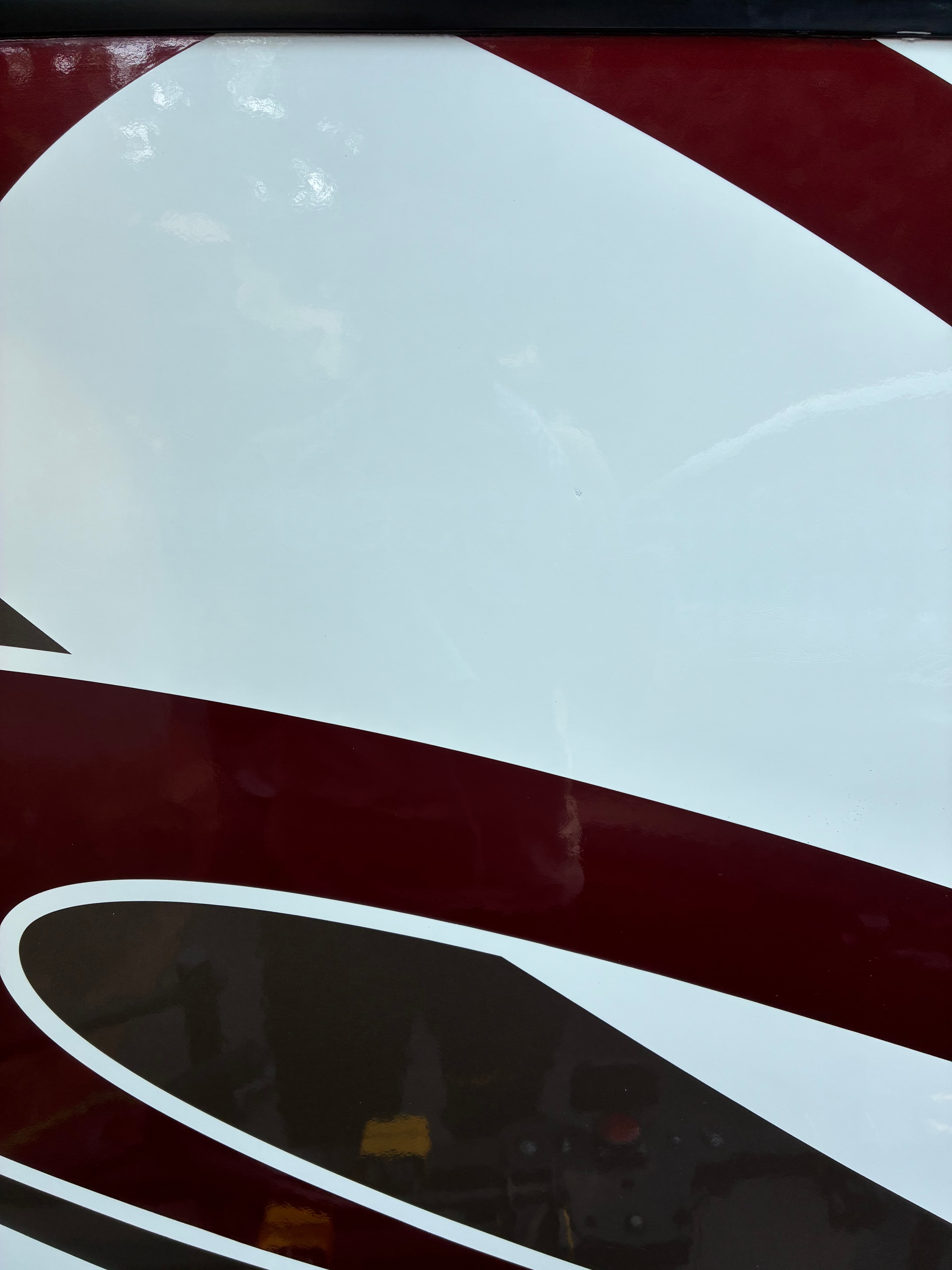 Class A motorhome graphic side panel bright white and glossy after professional wash and wax in Edmonds, WA