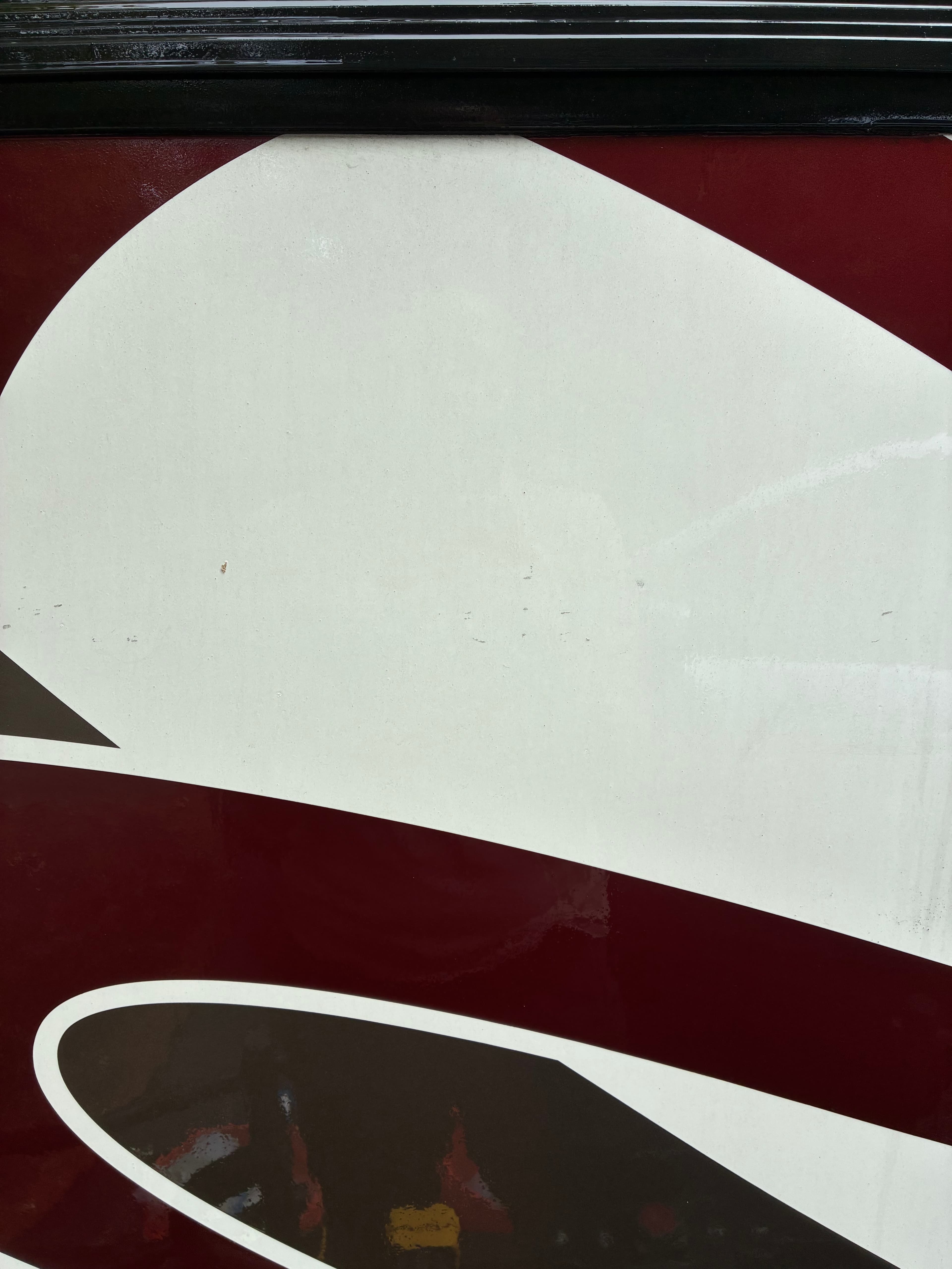 Class A motorhome graphic side panel with oxidation and dull finish before mobile wash and wax in Edmonds, WA