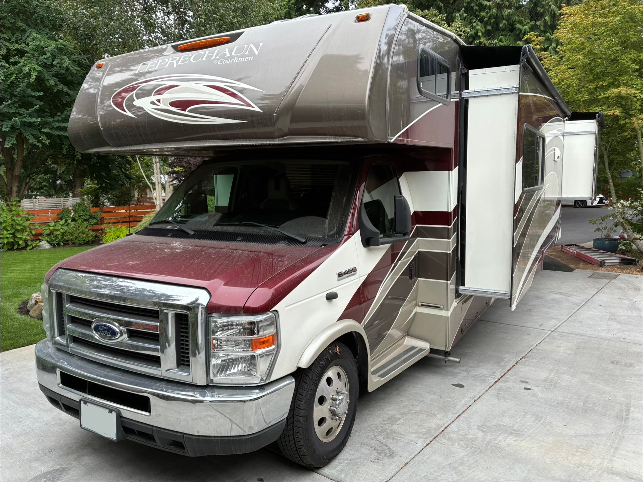 Coachmen Leprechaun Class C motorhome with dull and dirty exterior before mobile wash and wax in Edmonds, WA