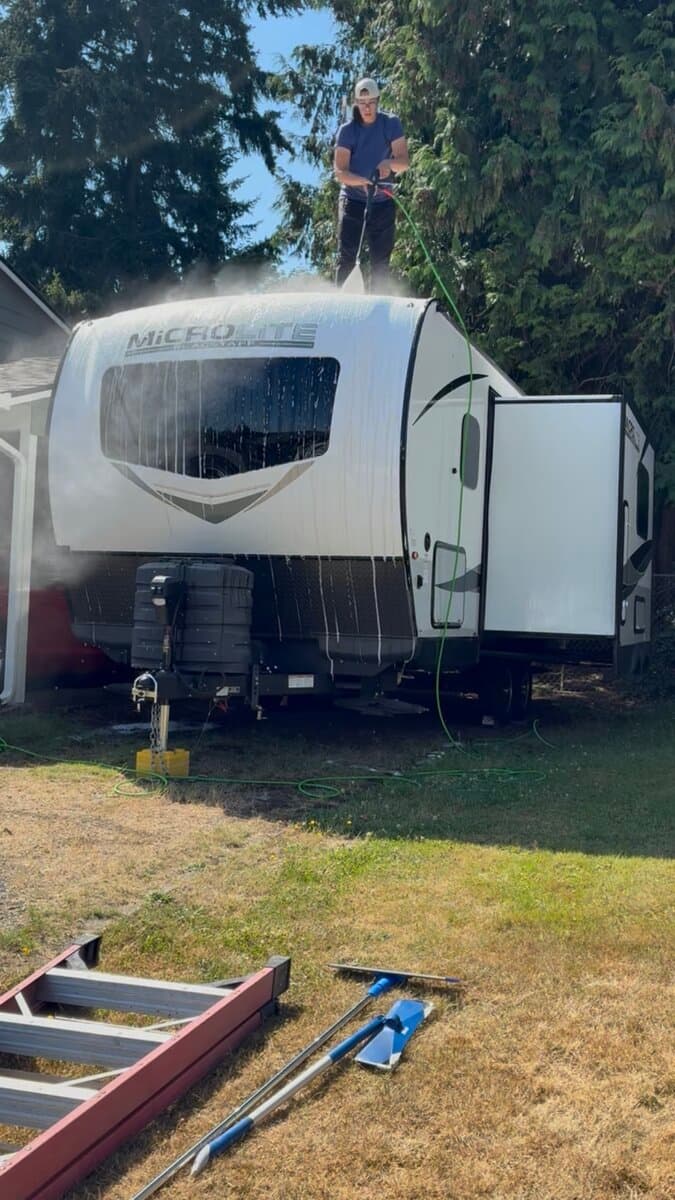 Pressure washing the roof of a travel trailer