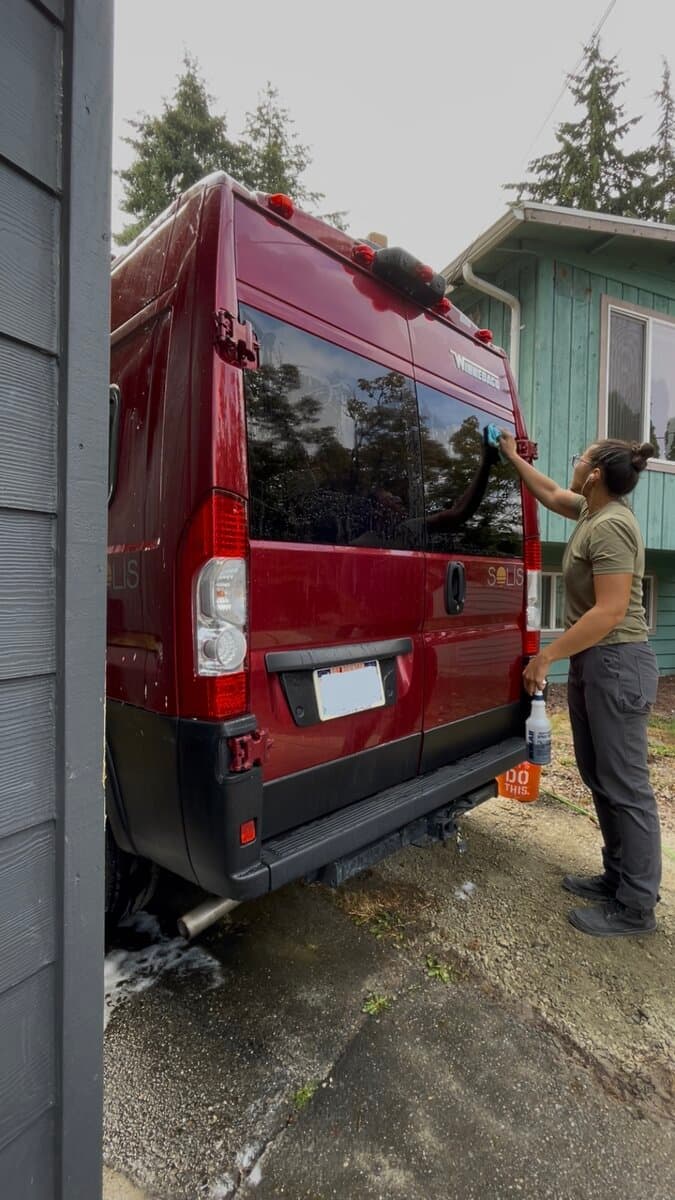 Washing the rear of a Winnebago Solis van